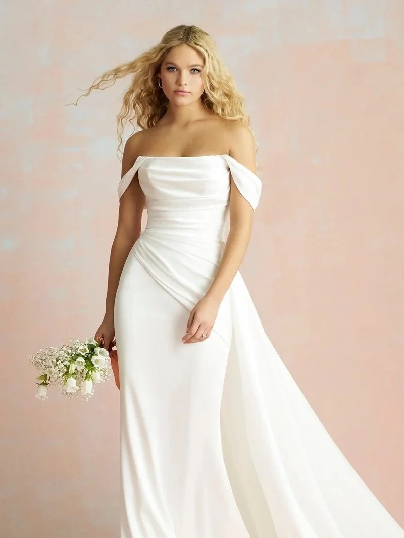 ✨ R3856NC Olivia!! ✨

Meet Olivia, a brand NEW SEASON style from @allurebridals Romance. *The* style that showcases modern minimalism meeting timeless beauty!!

Effortlessly elegant, she&rsquo;s a satin sheath with dreamy off-shoulder sleeves, ruchin