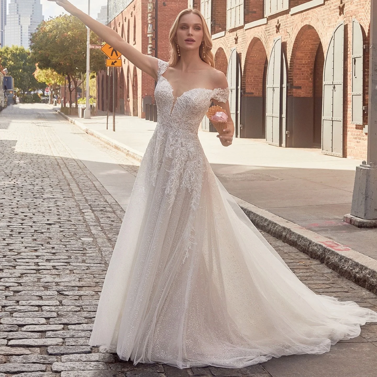 ✨ New size 8 off the peg arrival!! ✨

Abstractly sprinkled with glitter and tonal beaded appliques, this beauty sparkles like ice, from the off shoulder straps to the delicate A-line skirt!! 

Designer: Madison James

Colour: Mocha