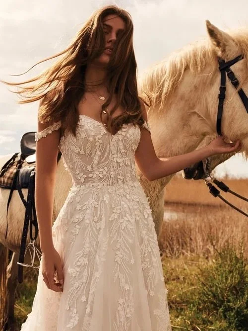 ✨ 66176 ✨

This absolute beauty by @bylillianwest has just arrived and I&rsquo;m SO excited for you guys to see her in January - I know you&rsquo;re going to love her!!

She&rsquo;s a Off-the-Shoulder A-Line Gown with Dimensional Lace and Low Back &h