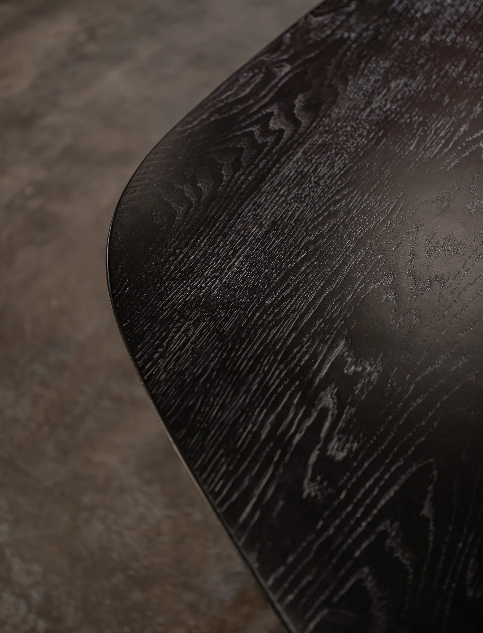 Solid timber dining table with handcrafted detailing and an enduring furniture finish.