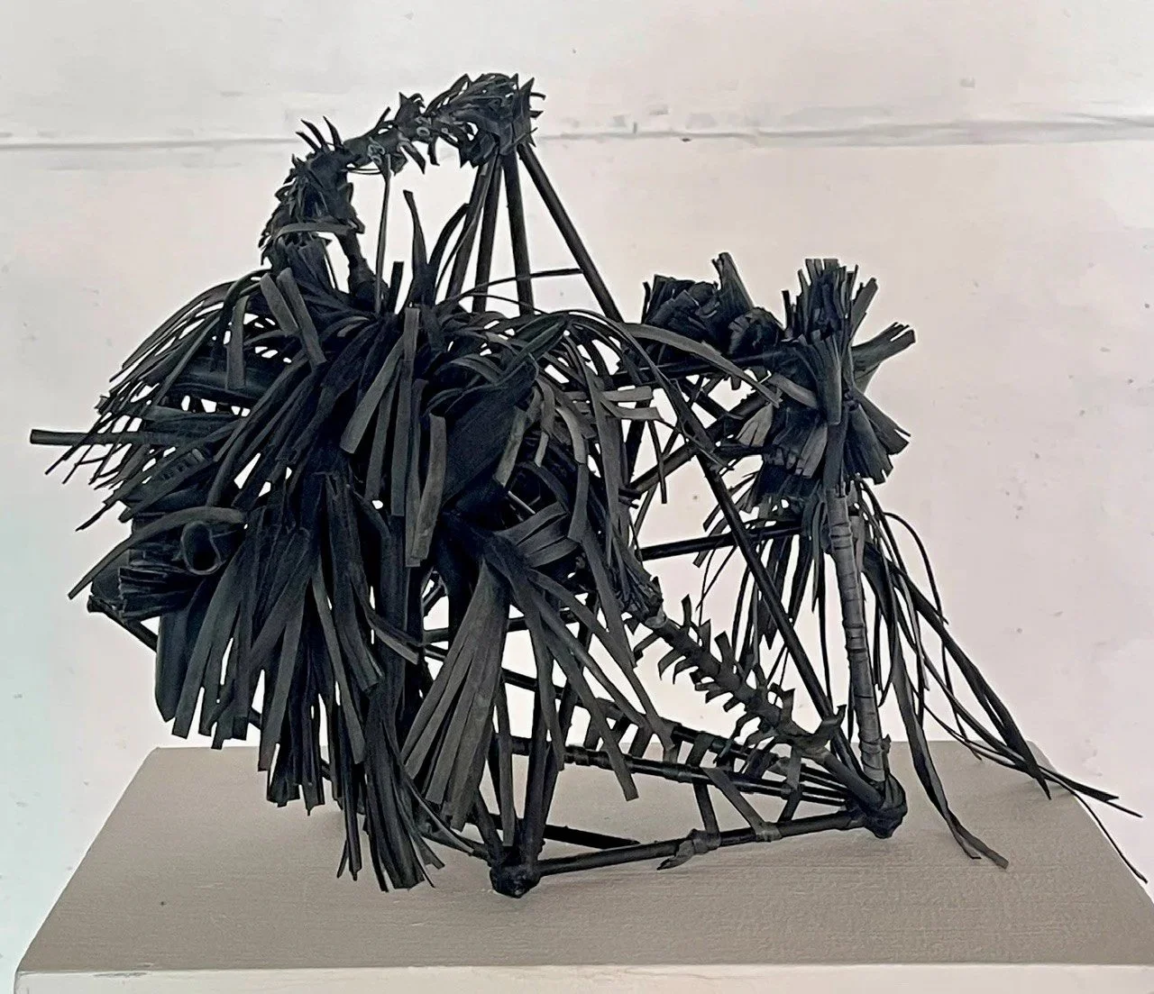 'Tyred' - mild steel, recycled bicycle innertubes.