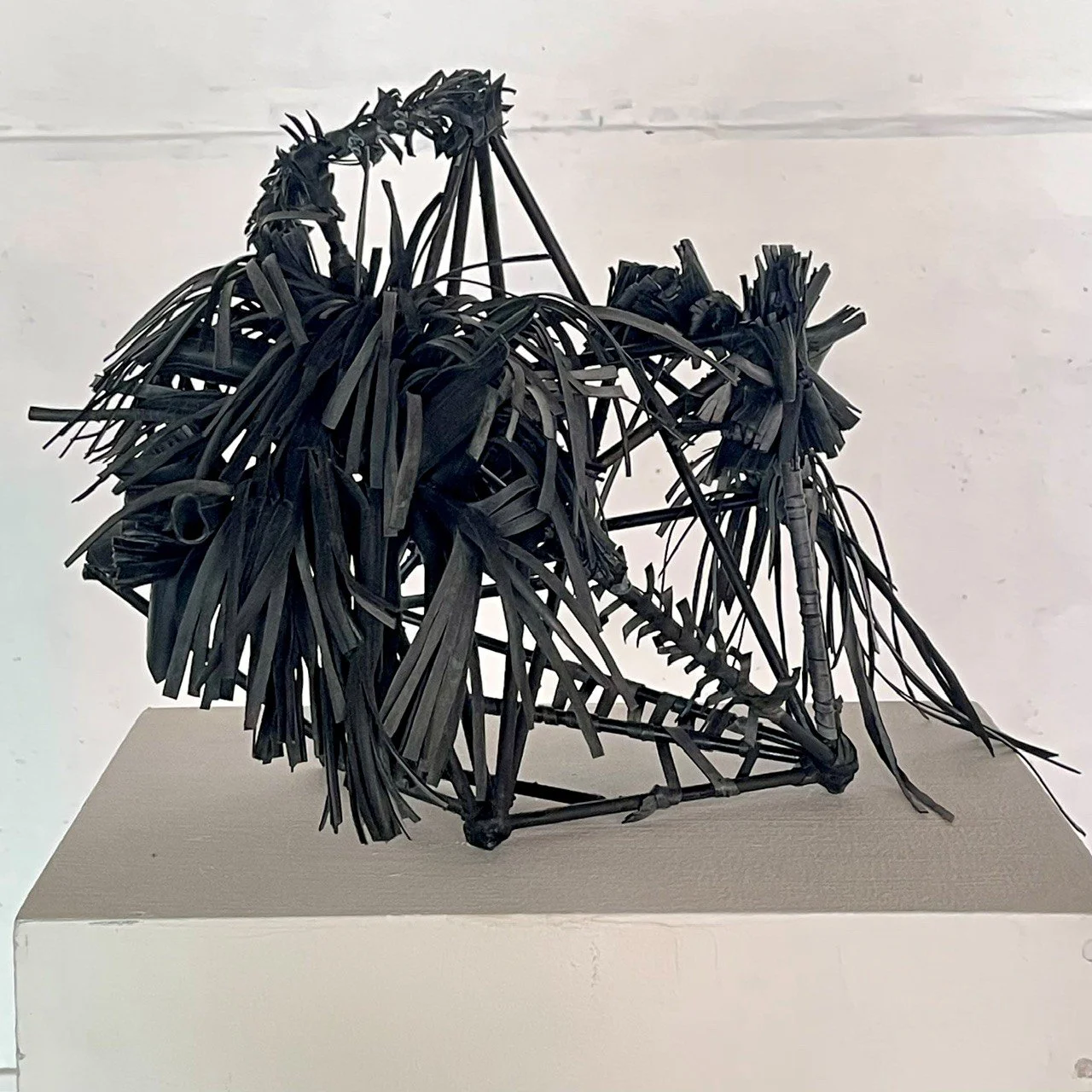 'Tyred' - mild steel, recycled bicycle innertubes.