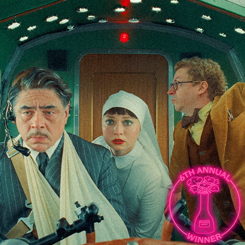 Three men dressed in vintage clothing walking among concrete columns at a film set with a cloudy sky in the background, featuring a circular badge in the bottom right corner that reads 'The 5th Annual Dillweed Society Excellence in Film Awards Winner'.