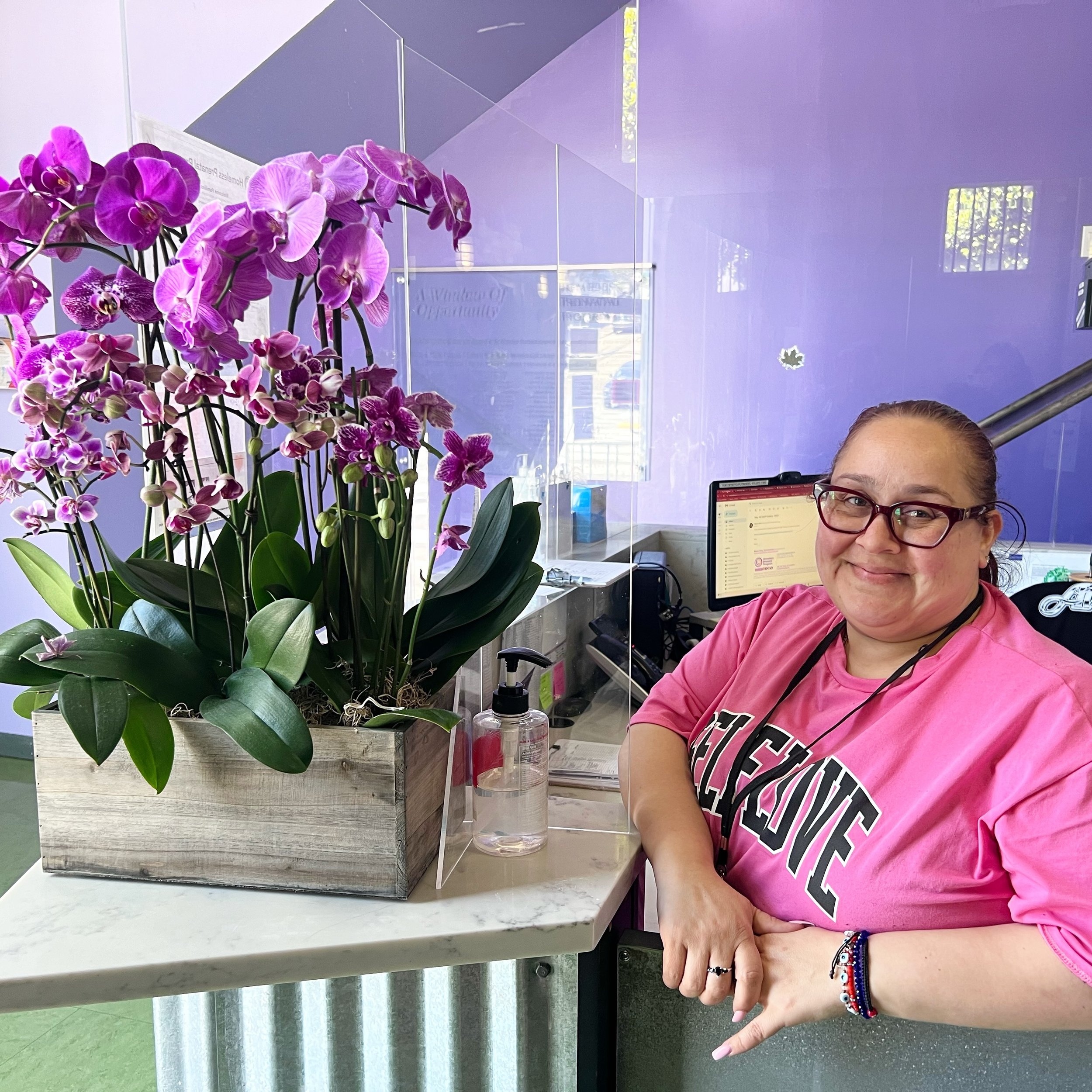 Special thank you to Rachel from @rachel_simplygrounded for gifting HPP this incredible orchid arrangement. It has added such vibrancy to our front lobby, pictured here with Bilingual Receptionist, Rosa.