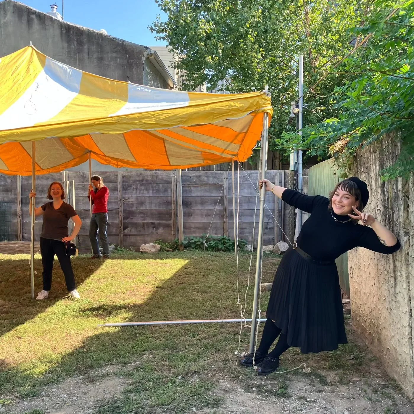 Bailey and Eliza did a little bit of everything for Saturday's celebration including erecting the tent!