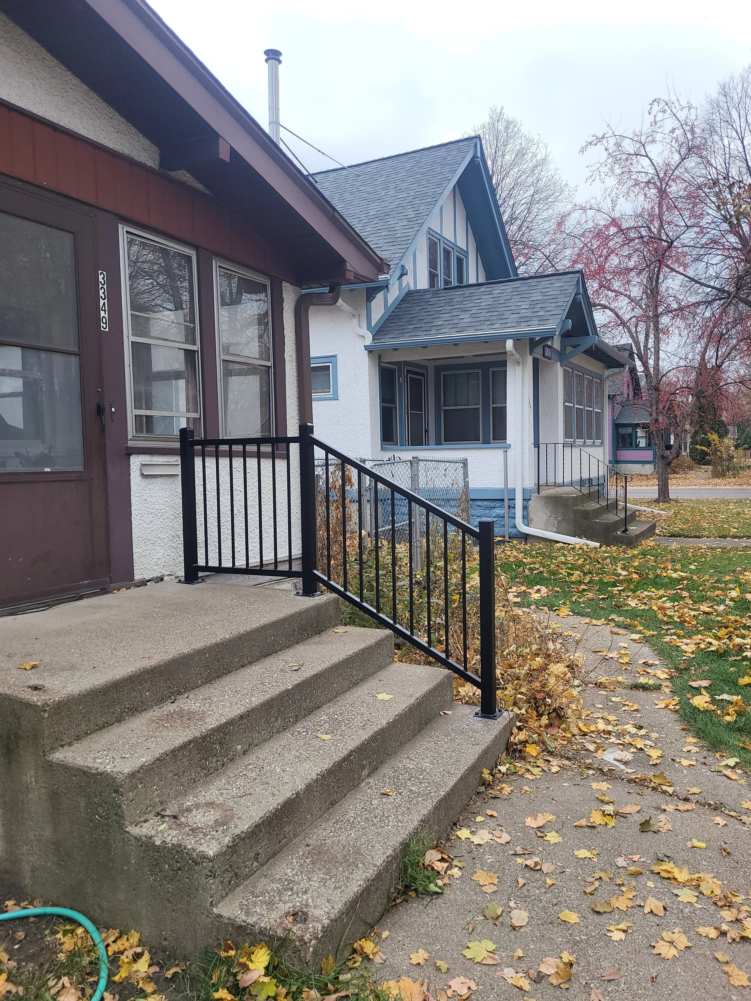 <img src="your-image.jpg" alt="Durable metal railings with custom powder coating, designed and installed by our company.">