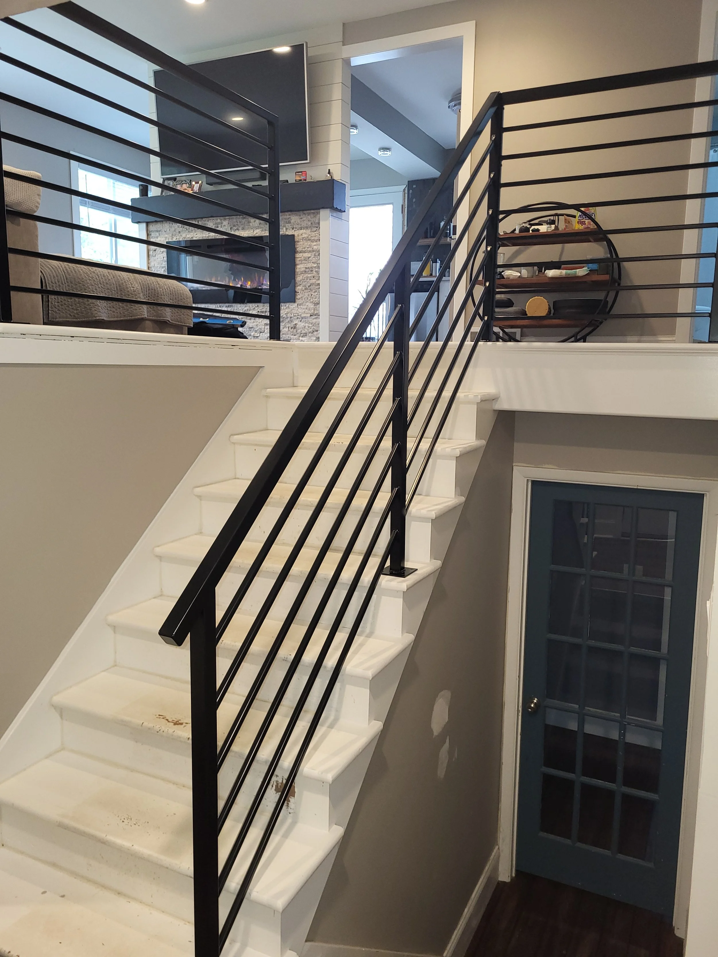 <img src="your-image.jpg" alt="Durable metal railings with custom powder coating, designed and installed by our company.">