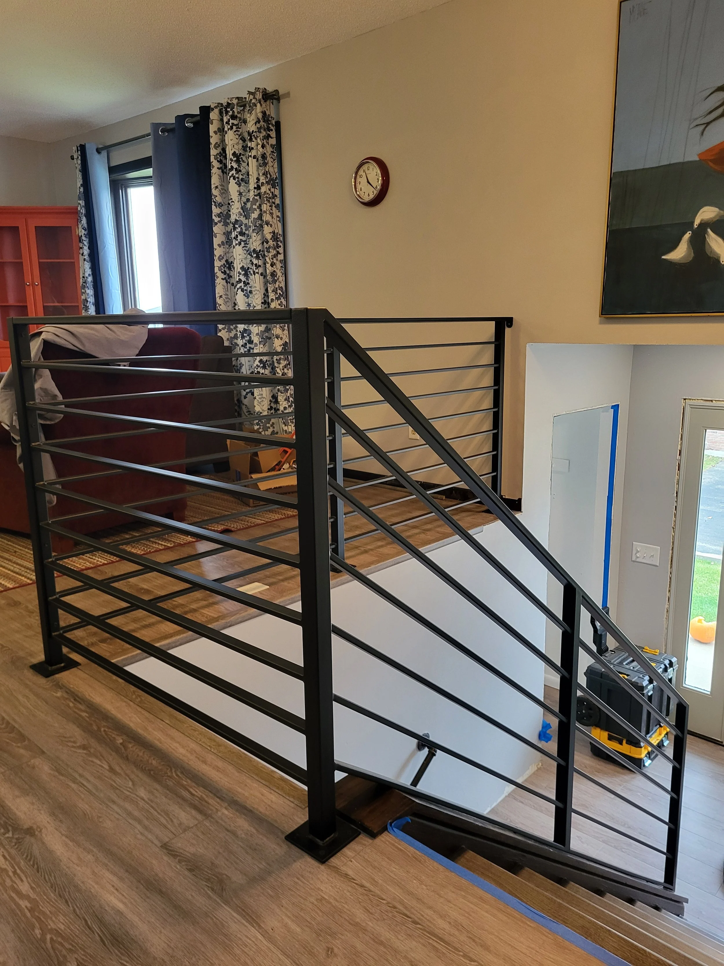 <img src="your-image.jpg" alt="Durable metal railings with custom powder coating, designed and installed by our company.">