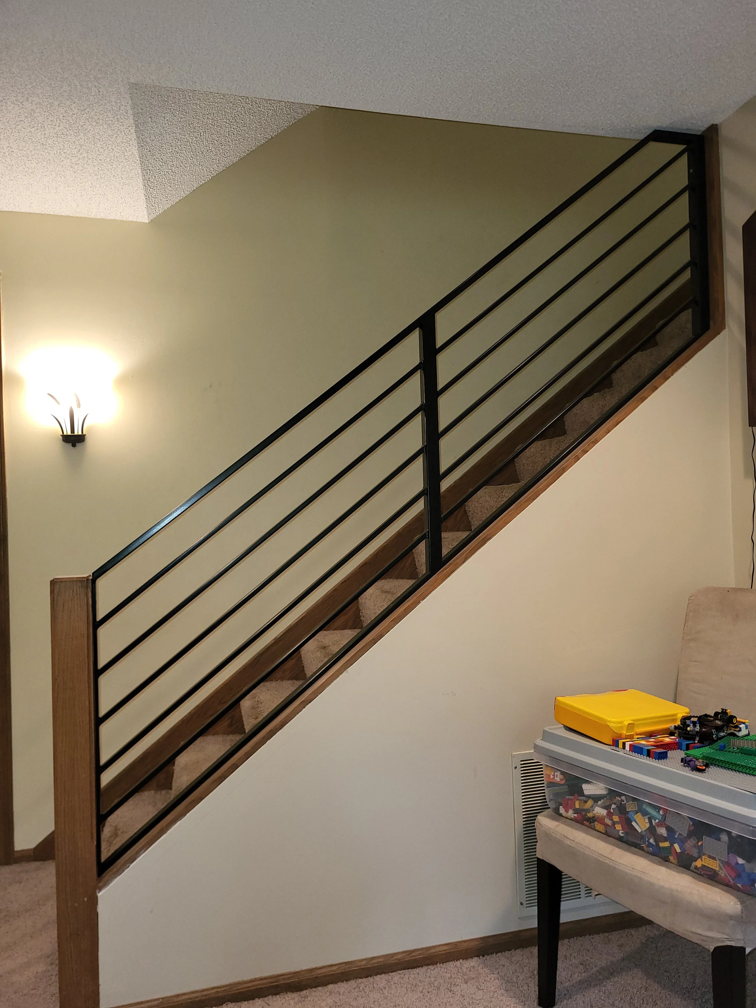 <img src="your-image.jpg" alt="Durable metal railings with custom powder coating, designed and installed by our company.">
