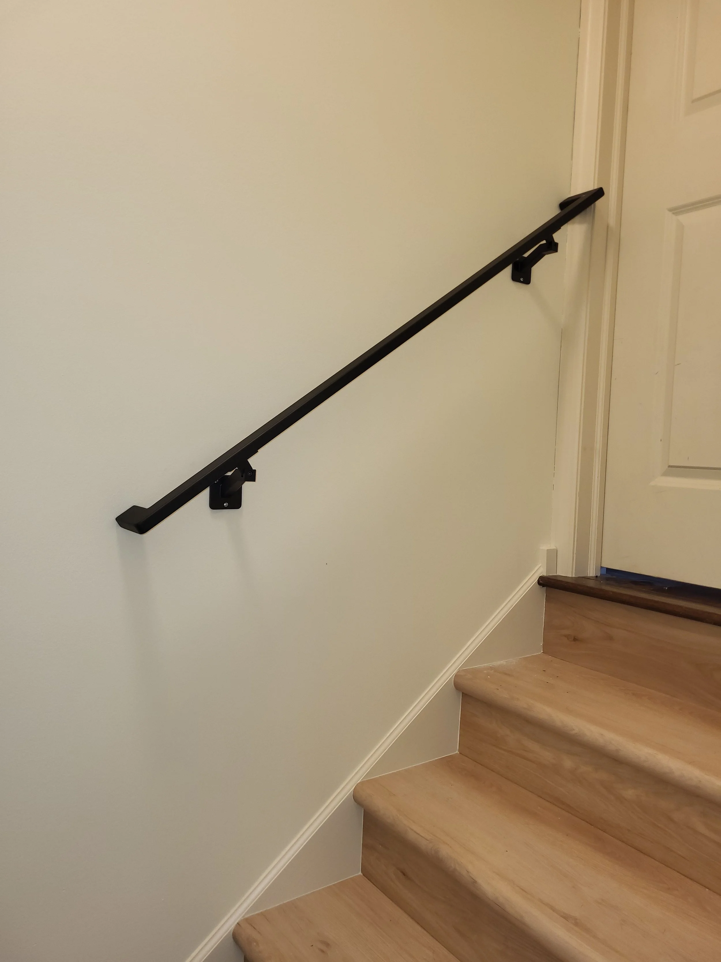 <img src="your-image.jpg" alt="Durable metal railings with custom powder coating, designed and installed by our company.">