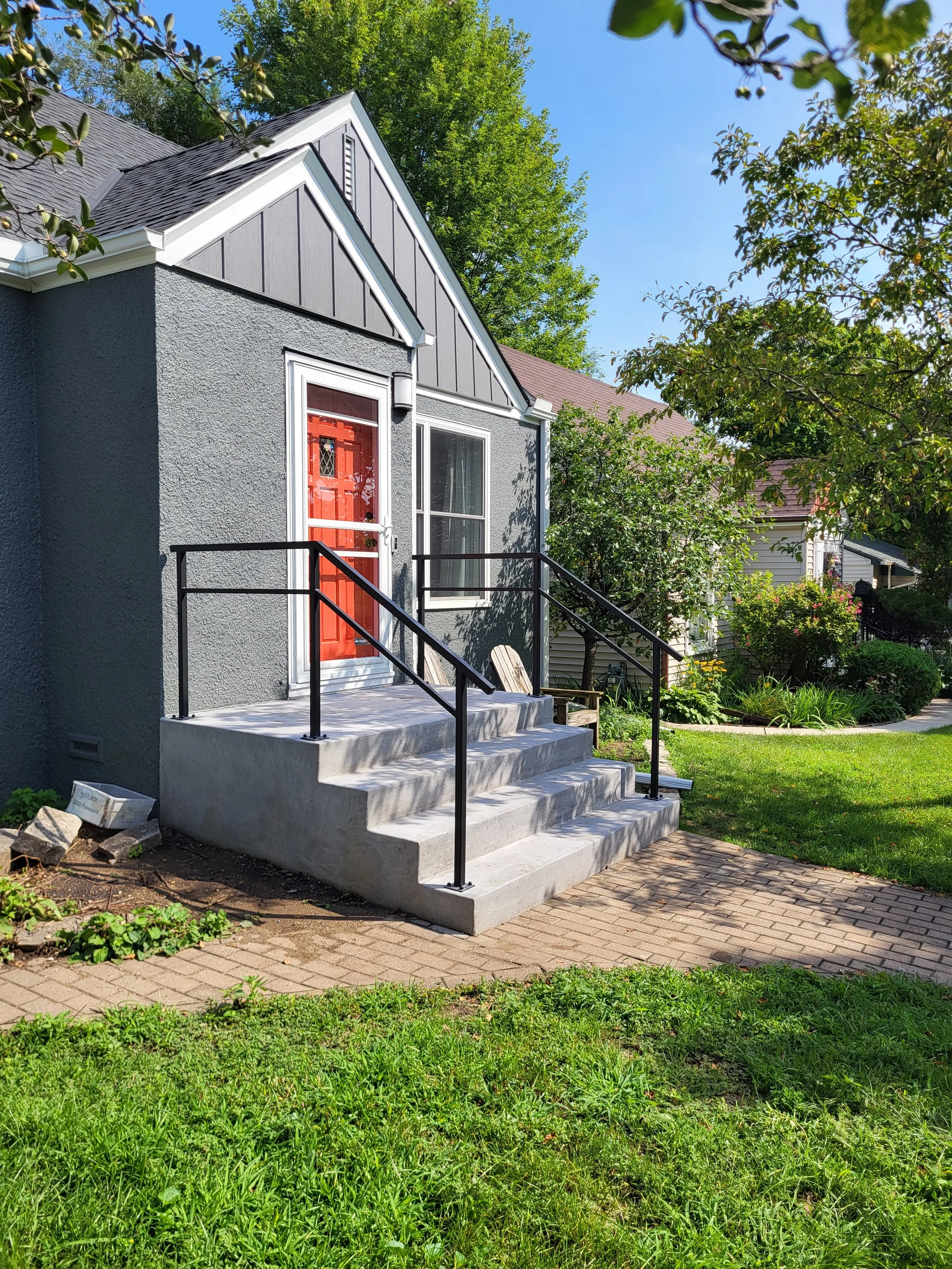 <img src="your-image.jpg" alt="Durable metal railings with custom powder coating, designed and installed by our company.">