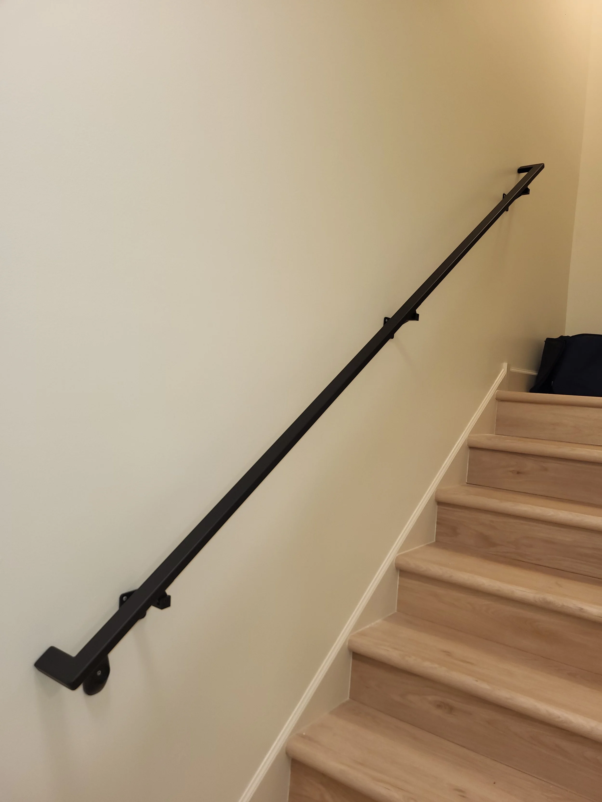 <img src="your-image.jpg" alt="Durable metal railings with custom powder coating, designed and installed by our company.">