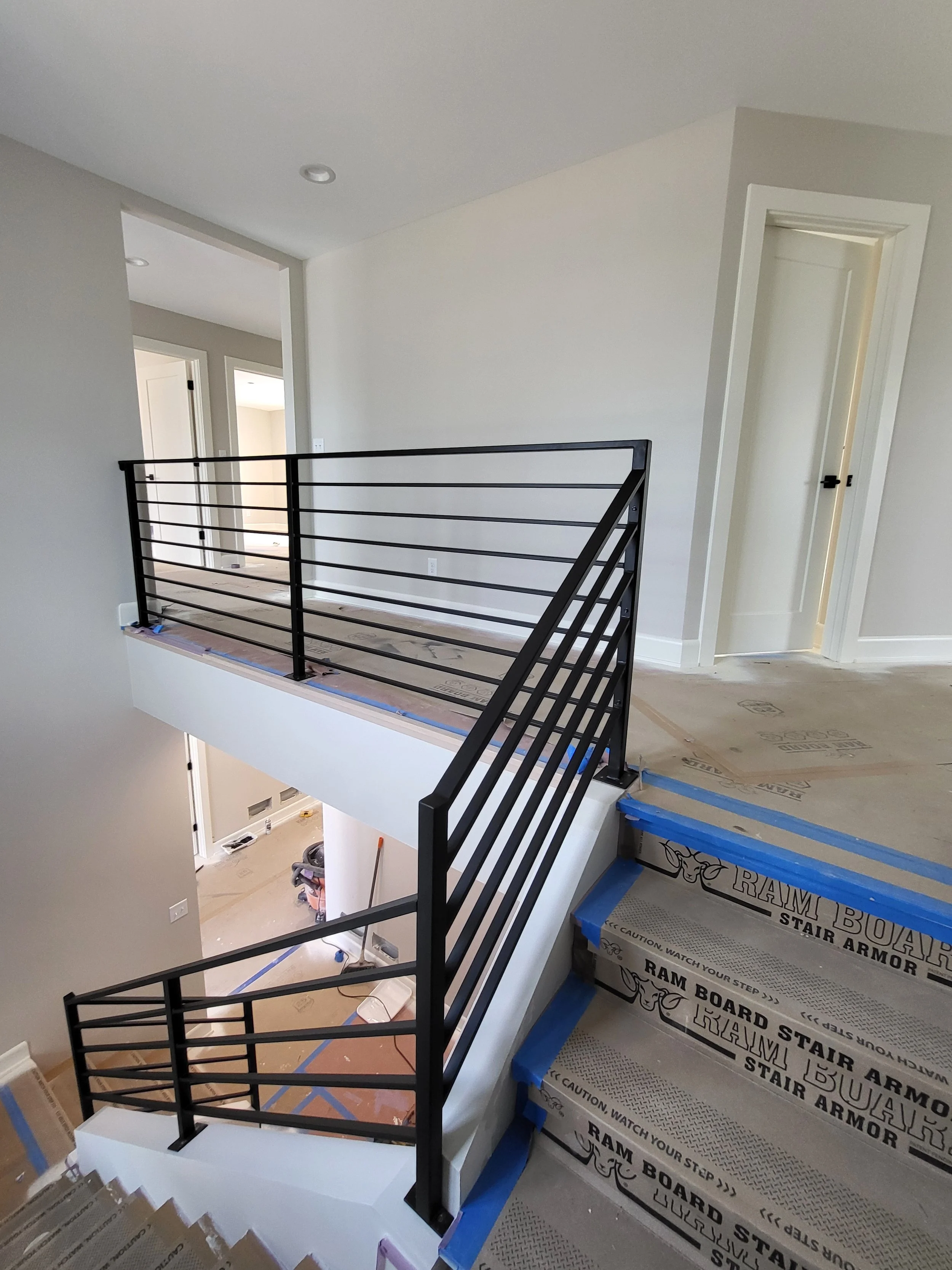 <img src="your-image.jpg" alt="Durable metal railings with custom powder coating, designed and installed by our company.">