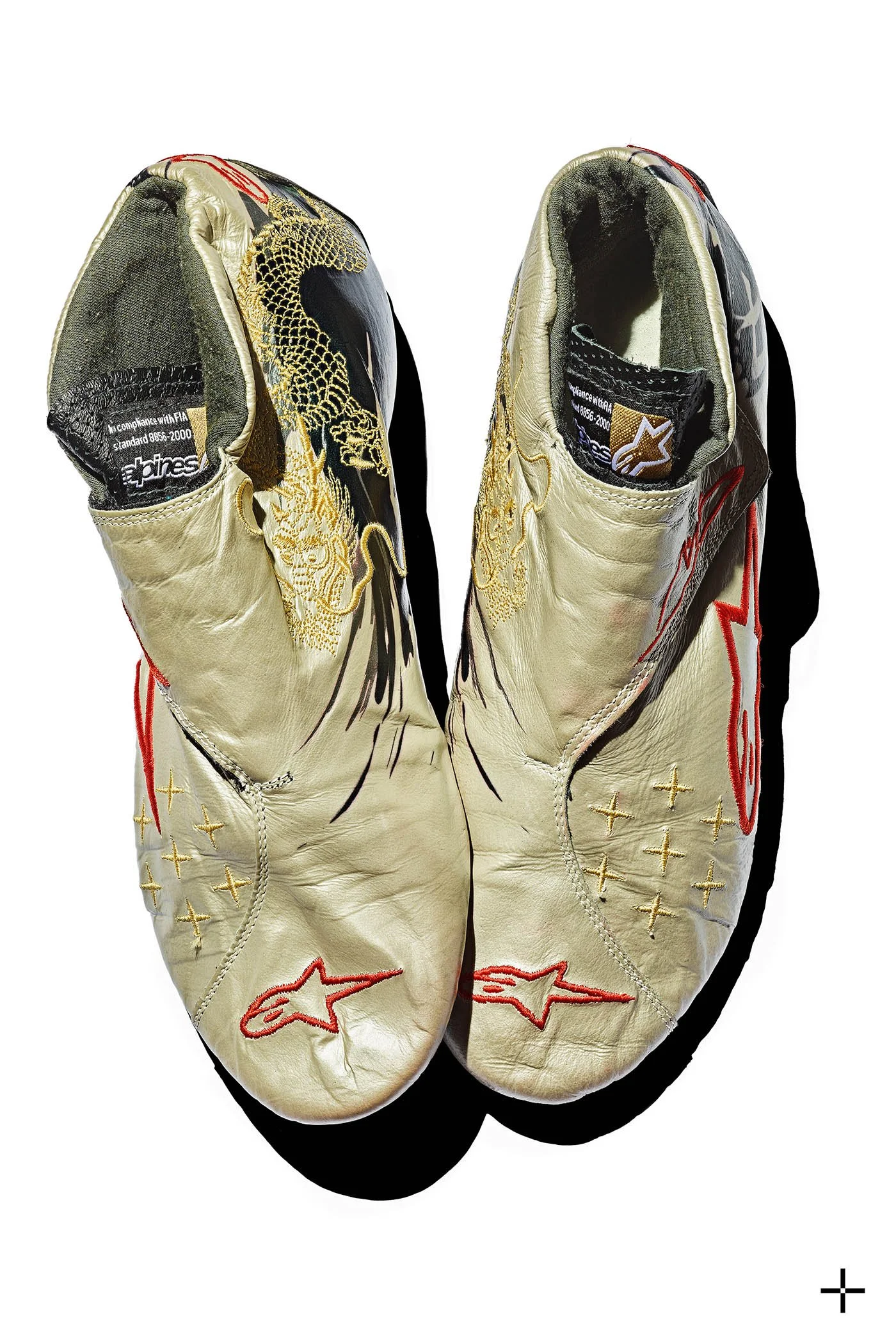 Fine art photographic print of iconic Grand Prix winning racing shoes boots belonging to racing legend Michael Schumacher: a multi-focal composit artwork of astonishing clarity and depth. The perfect automotive gift for collectors.