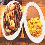 Party Plater 1.5Lbs of  fajita, chicken, & Shrimp bell peppers, onions,rice and beans