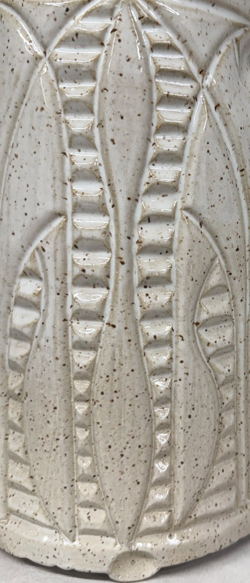 "Santorini White" set in the farmhouse style. The collection features speckles with a blush of toasty brown. This set serves to enhance the carving and unify the form.  Classic and classy.