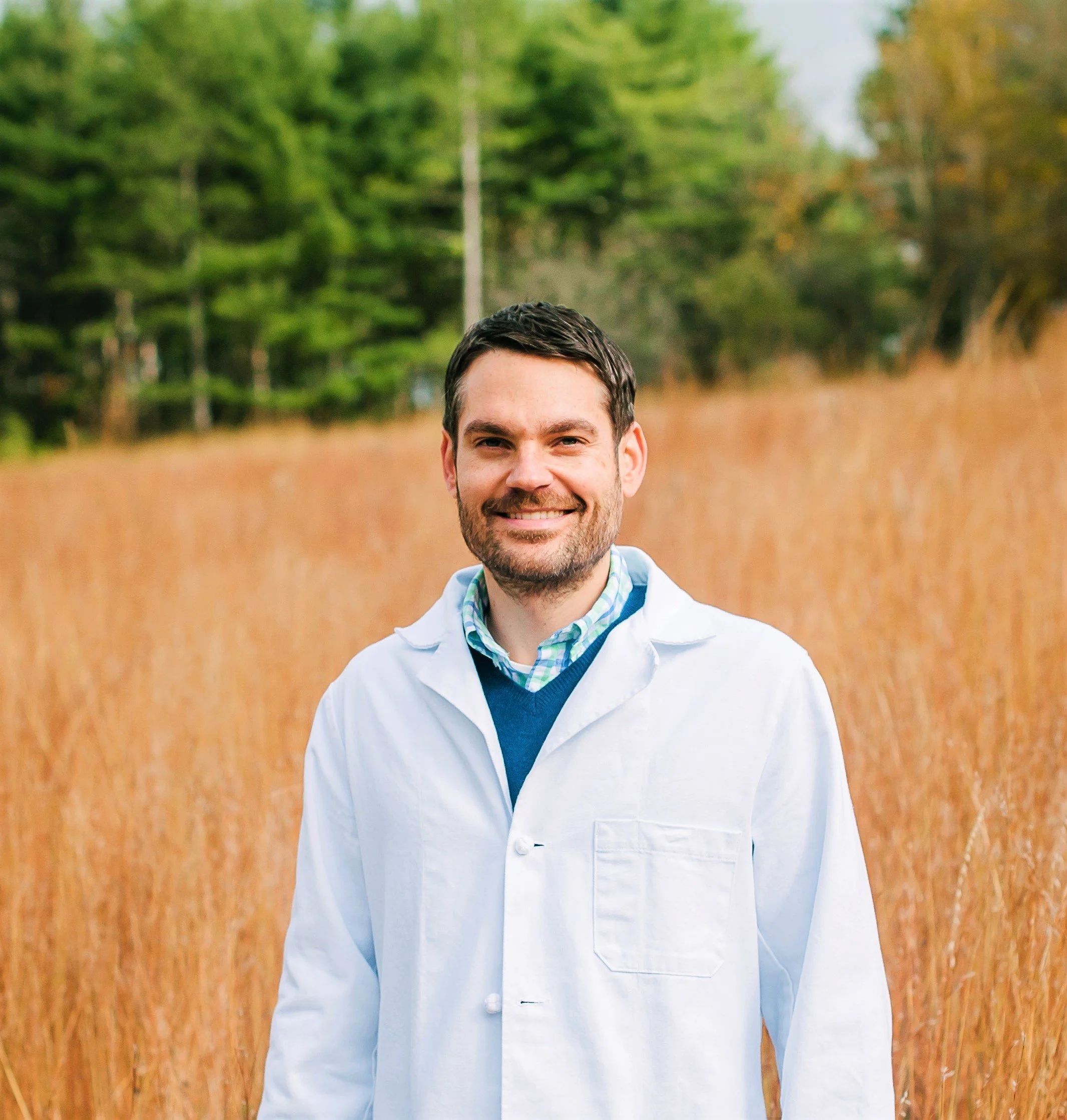Photo of Nic of Delafield Acupuncture standing in a field