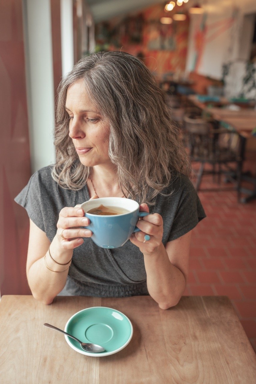 Enjoying herbal tea in a café - photo by Jenise Poitras