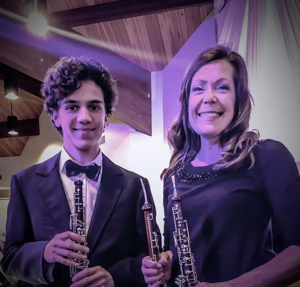 Students are encouraged to play along side experienced performers. In this photo is Andy Nisipeanu.  He went on to med school after performing in the All State band in 2020.
