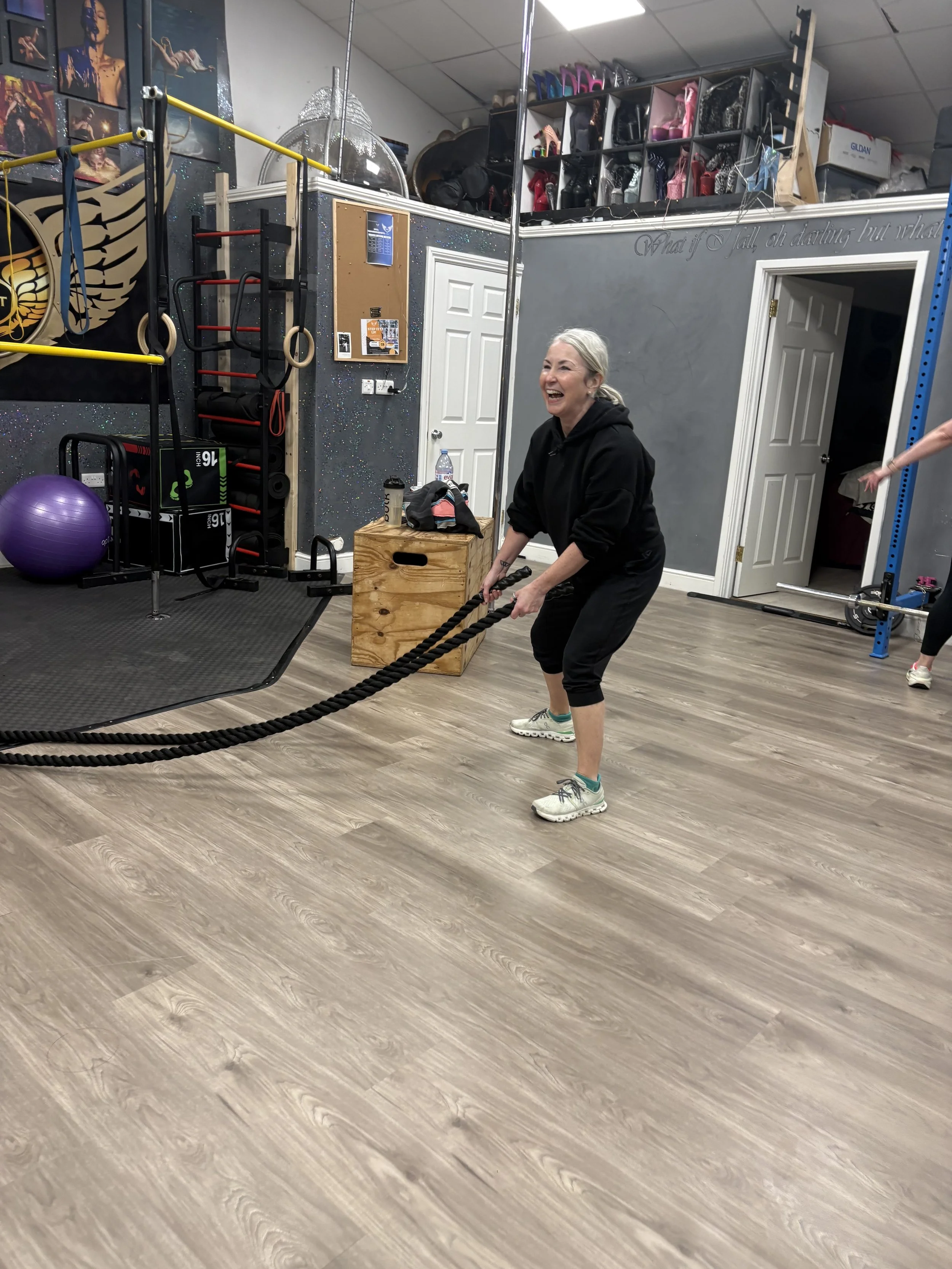 lady having fun in circuits class