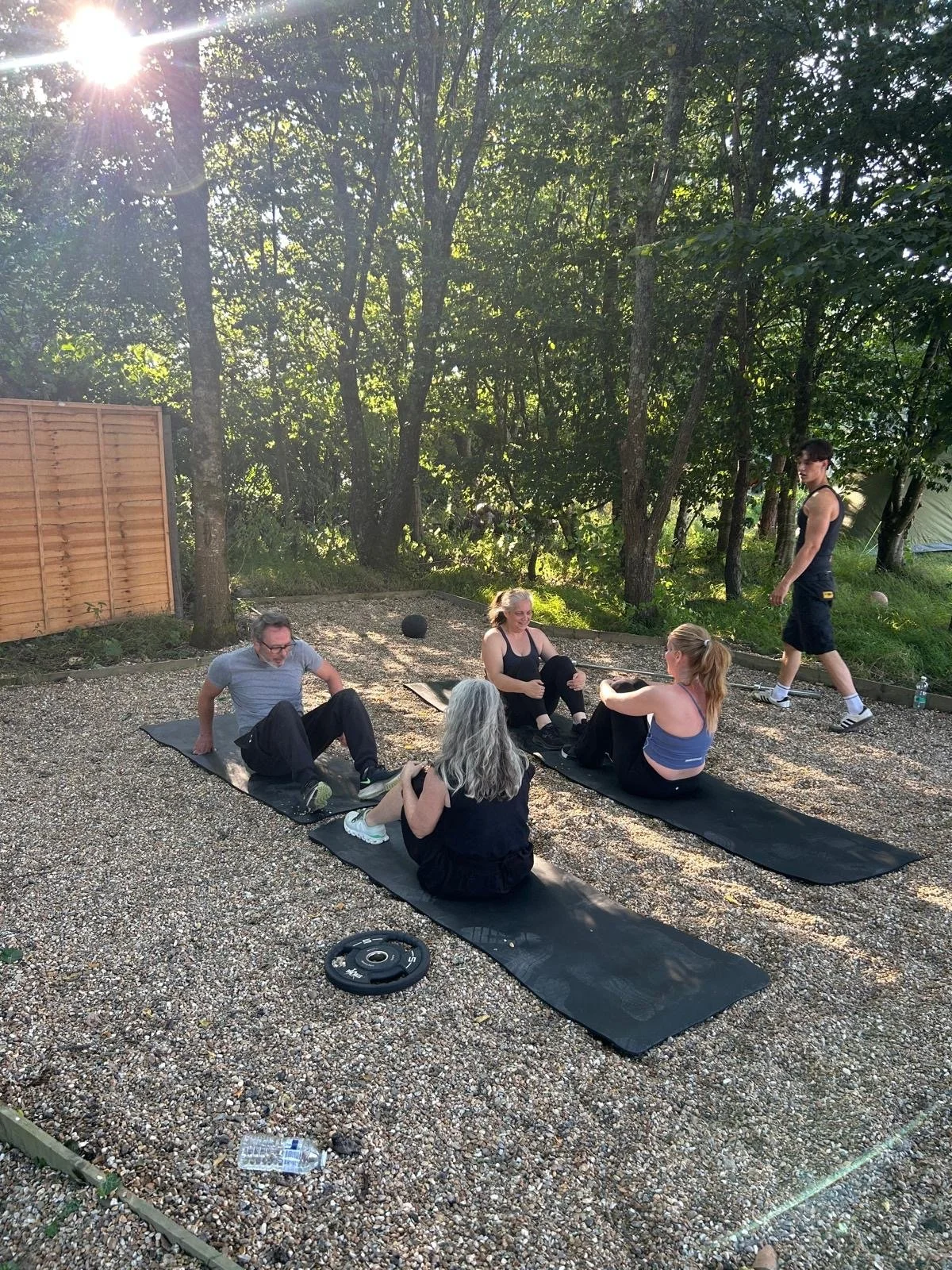 Group of people exercising in the sunshine