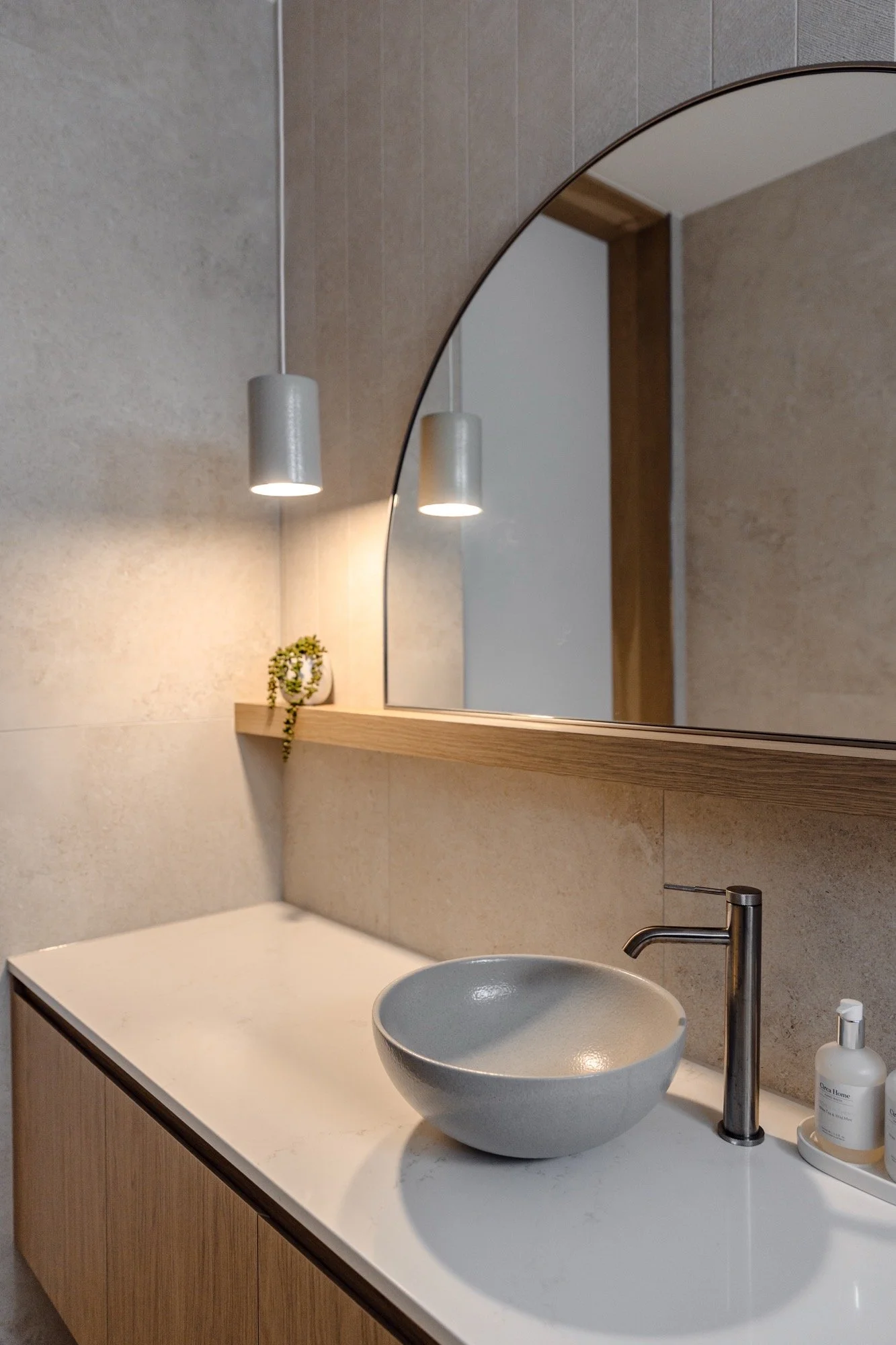 Concrete guest powder room with custom joinery of the Camp Hill home 'The Concrete Canvas' by Brisbane interior designer Melinda Fritz