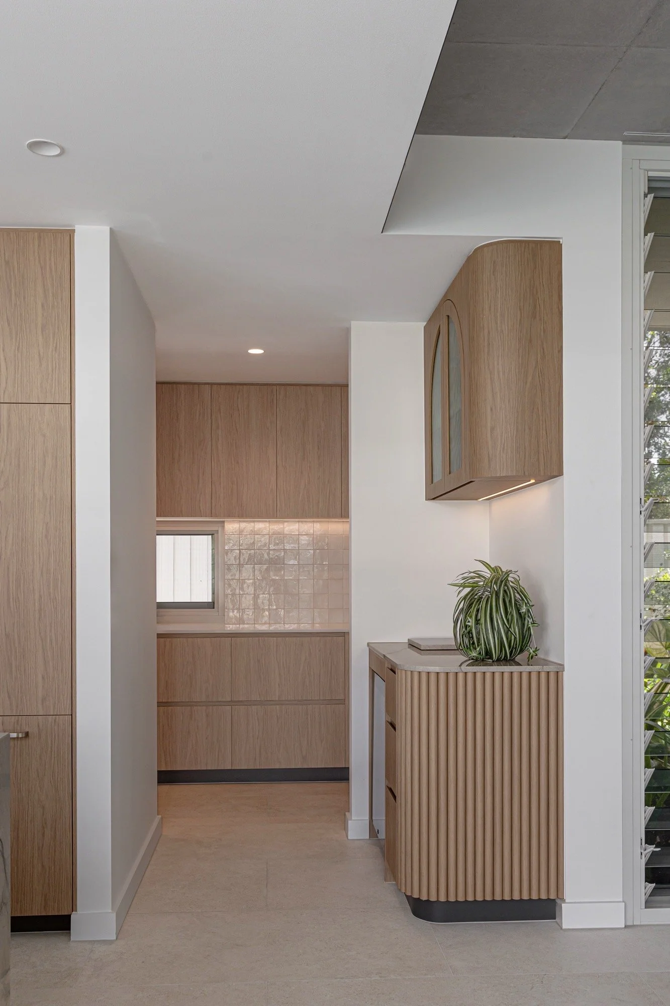 Multi-layered butler's pantry with bar workspace joinery of the Camp Hill home 'The Concrete Canvas' by Brisbane interior designer Melinda Fritz