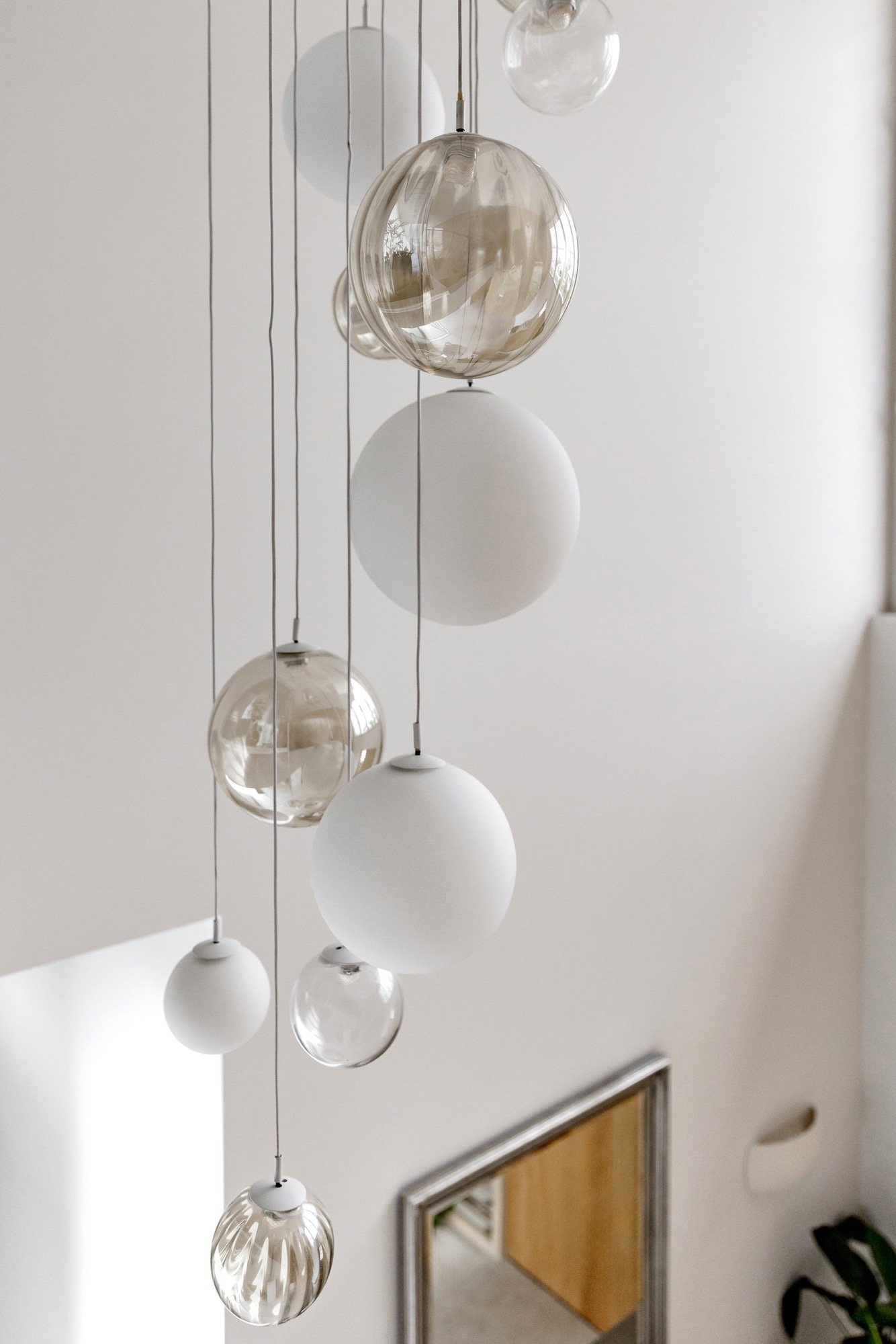 Feature pendant lights of the Camp Hill home 'The Concrete Canvas' by Brisbane interior designer Melinda Fritz