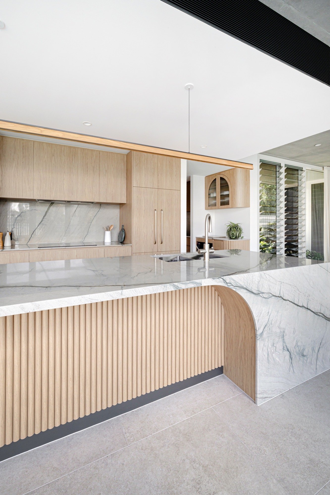 Tying together of materials in the custom kitchen of the Camp Hill home 'The Concrete Canvas' by Brisbane interior designer Melinda Fritz