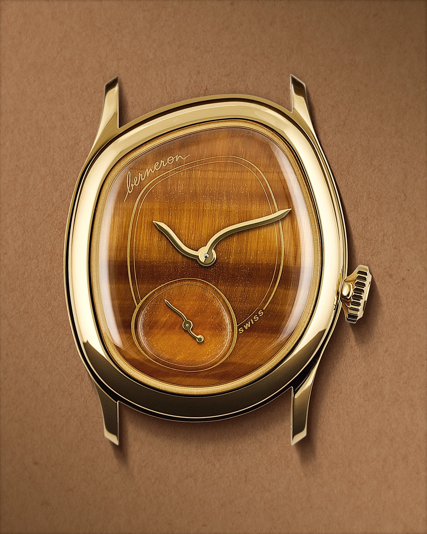 &bull; Mirage Tiger Eye
Thanks to its fundamental difference in design (case built around the movement and not the other way around), the Mirage collection consequently has its own aesthetic language, as if time were in motion while the watch is stil