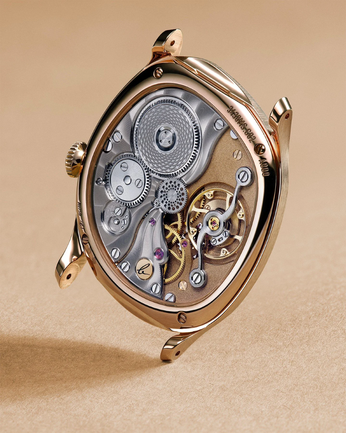 &bull; Caliber 233
We wanted to create far more than a movement: the Caliber 233 is a living piece of art, where mechanical precision meets poetic design.
Every curve, every reflection, every detail has been crafted to evoke a quiet but lasting emoti