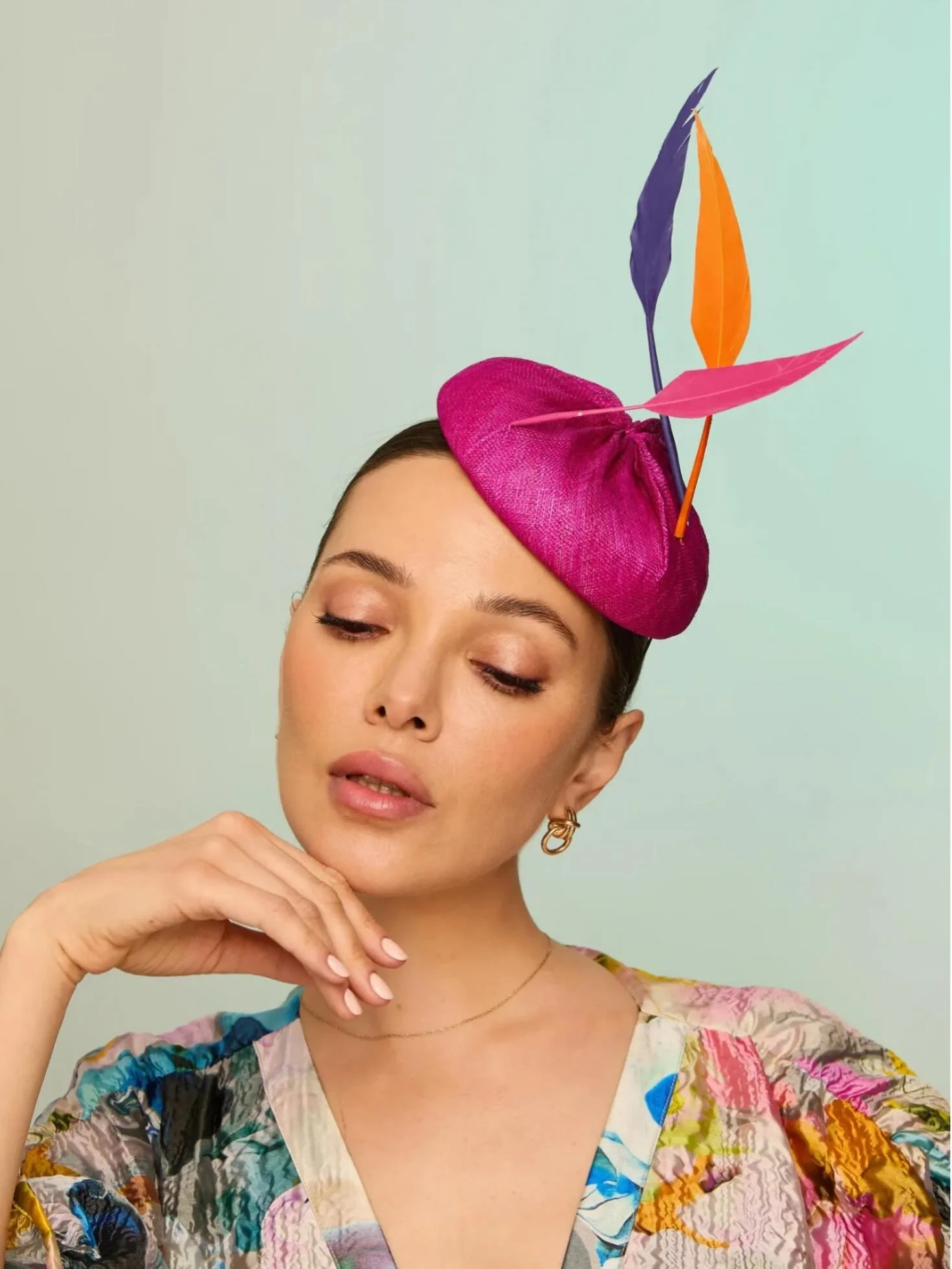 Introducing our button headpiece, Arabel, with hand-cut and dyed feathers. This piece has also been covered in a beautiful fuchsia pink.
This would be lovely to wear to a wedding or a smaller piece for Royal Ascot. 
All of our hats are handmade in ou