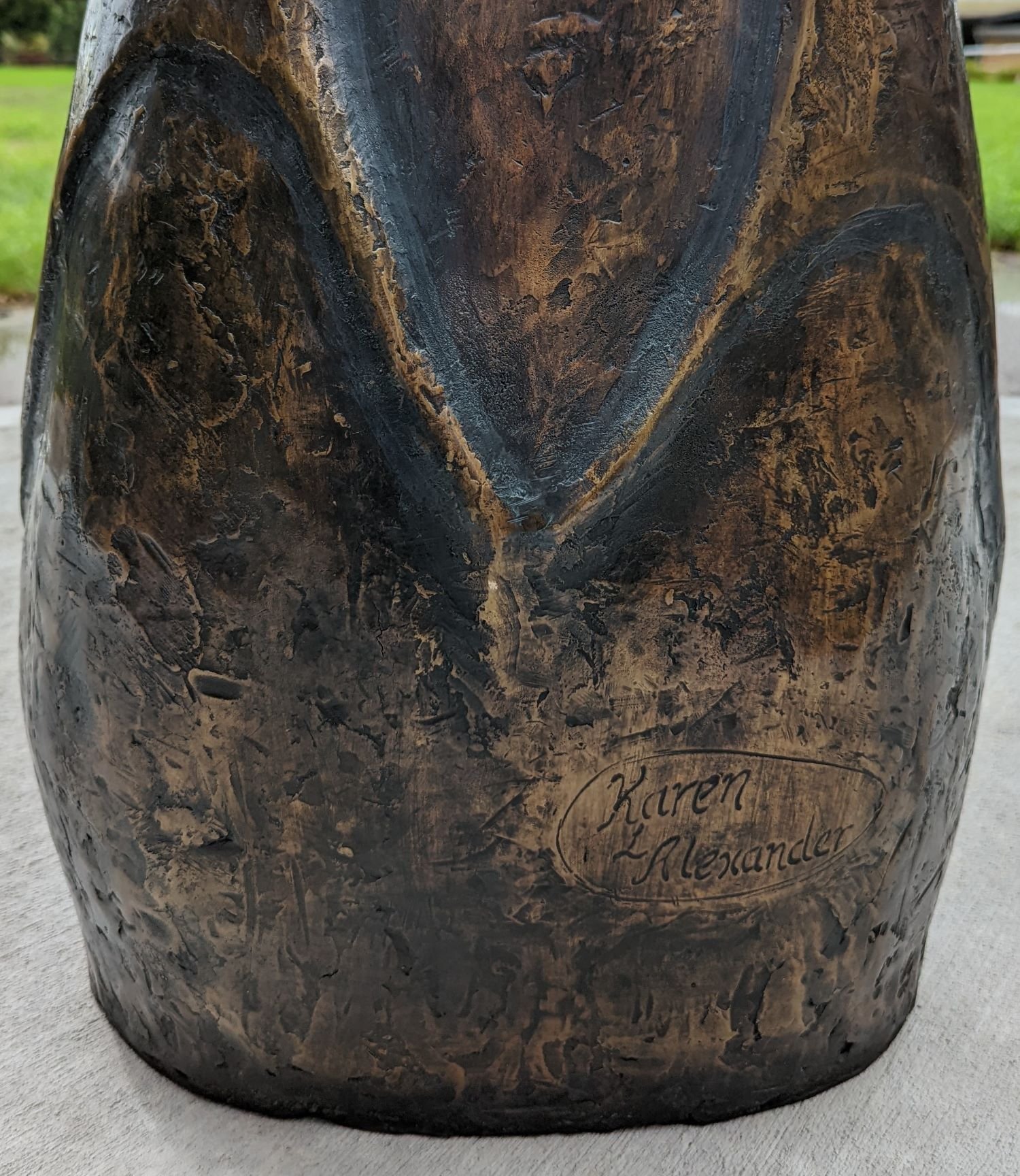 artist signature on bronze sculpture commission.jpg