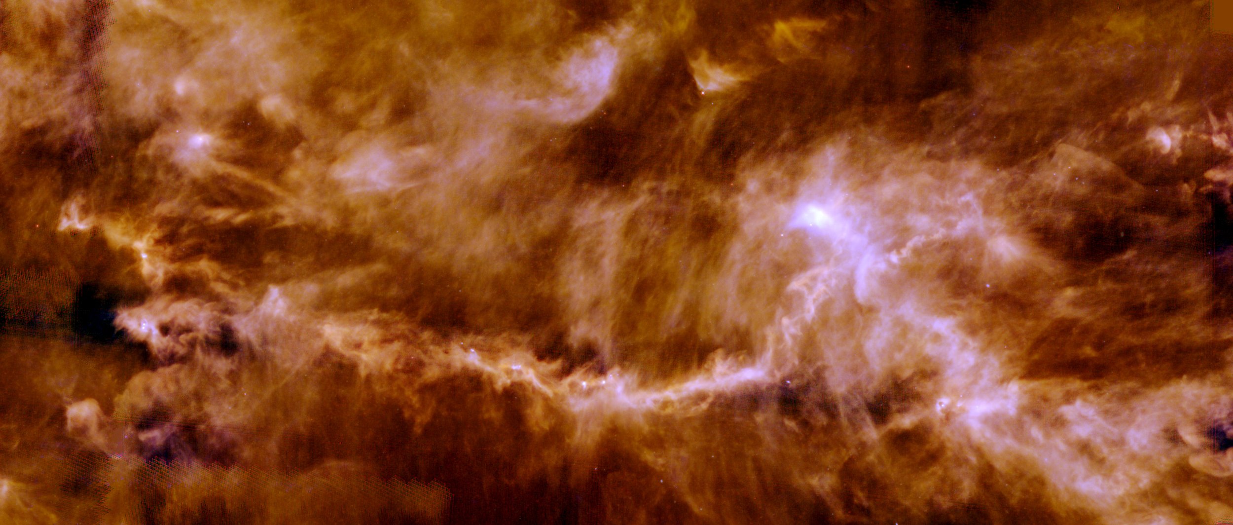 Imagen del observatorio espacial Herschel de la ESA que muestra la compleja red de gas y polvo en la nube molecular de Tauro, una vasta región de formación estelar situada a unos 450 años luz en la constelación de Tauro.