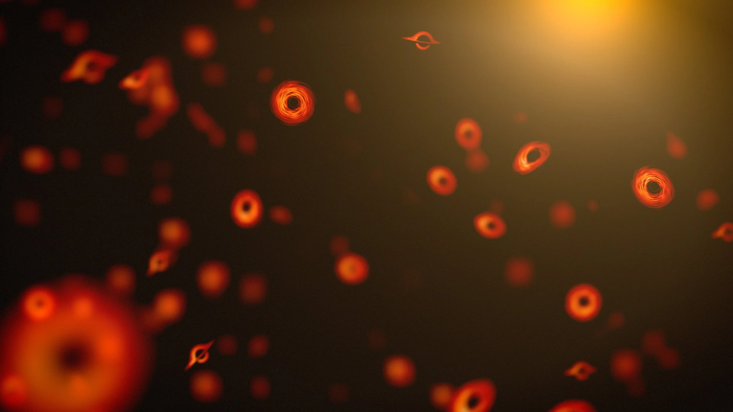 Concepto artístico que imagina de forma creativa cómo podrían ser los pequeños agujeros negros primordiales. En realidad, estos diminutos objetos tendrían grandes dificultades para formar los discos de acreción que aquí los hacen visibles.