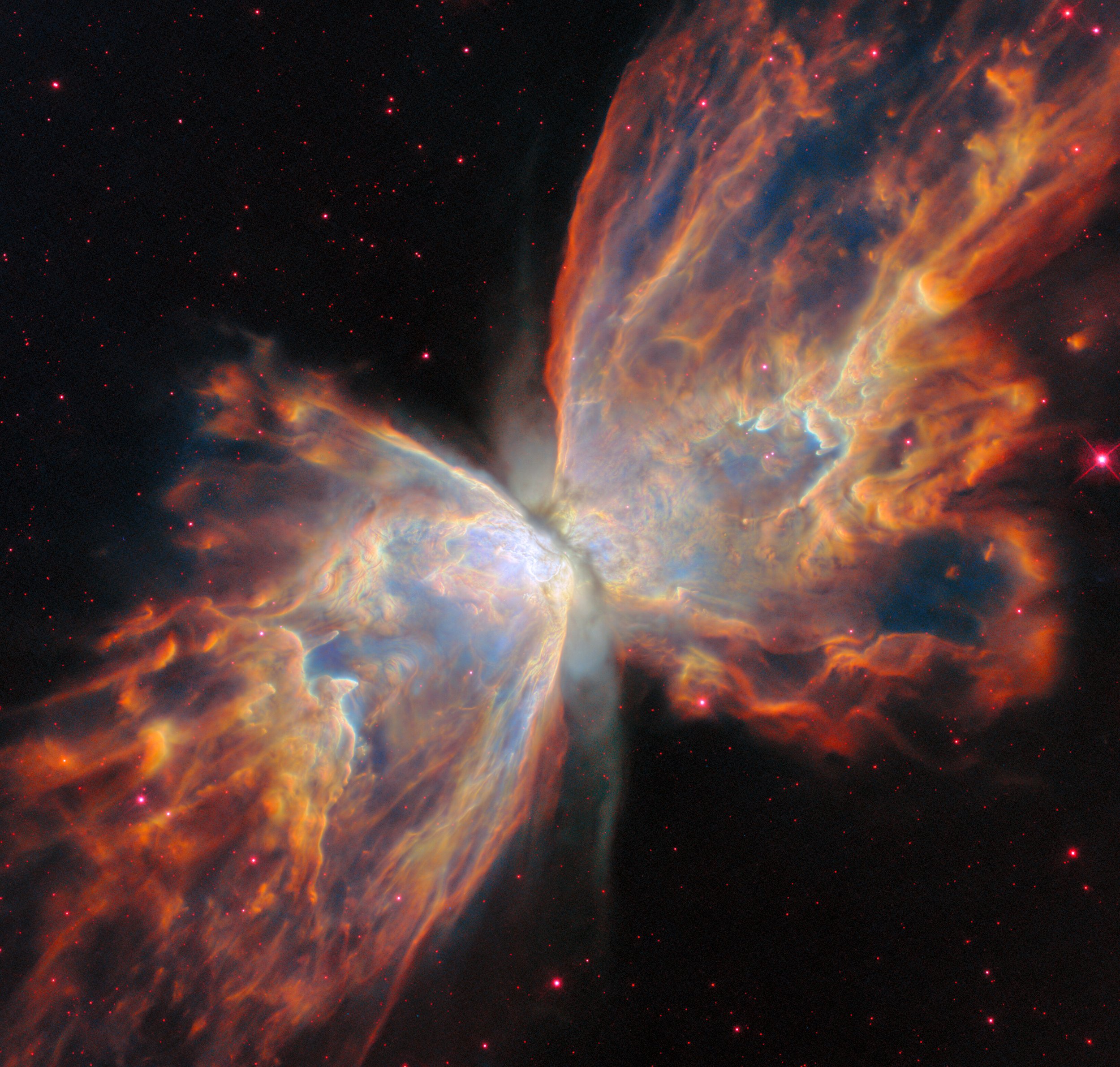 Imagen de la nebulosa planetaria NGC 6302, también conocida como la nebulosa de la Mariposa, donde el telescopio James Webb ha detectado hielo de dióxido de carbono (CO₂).