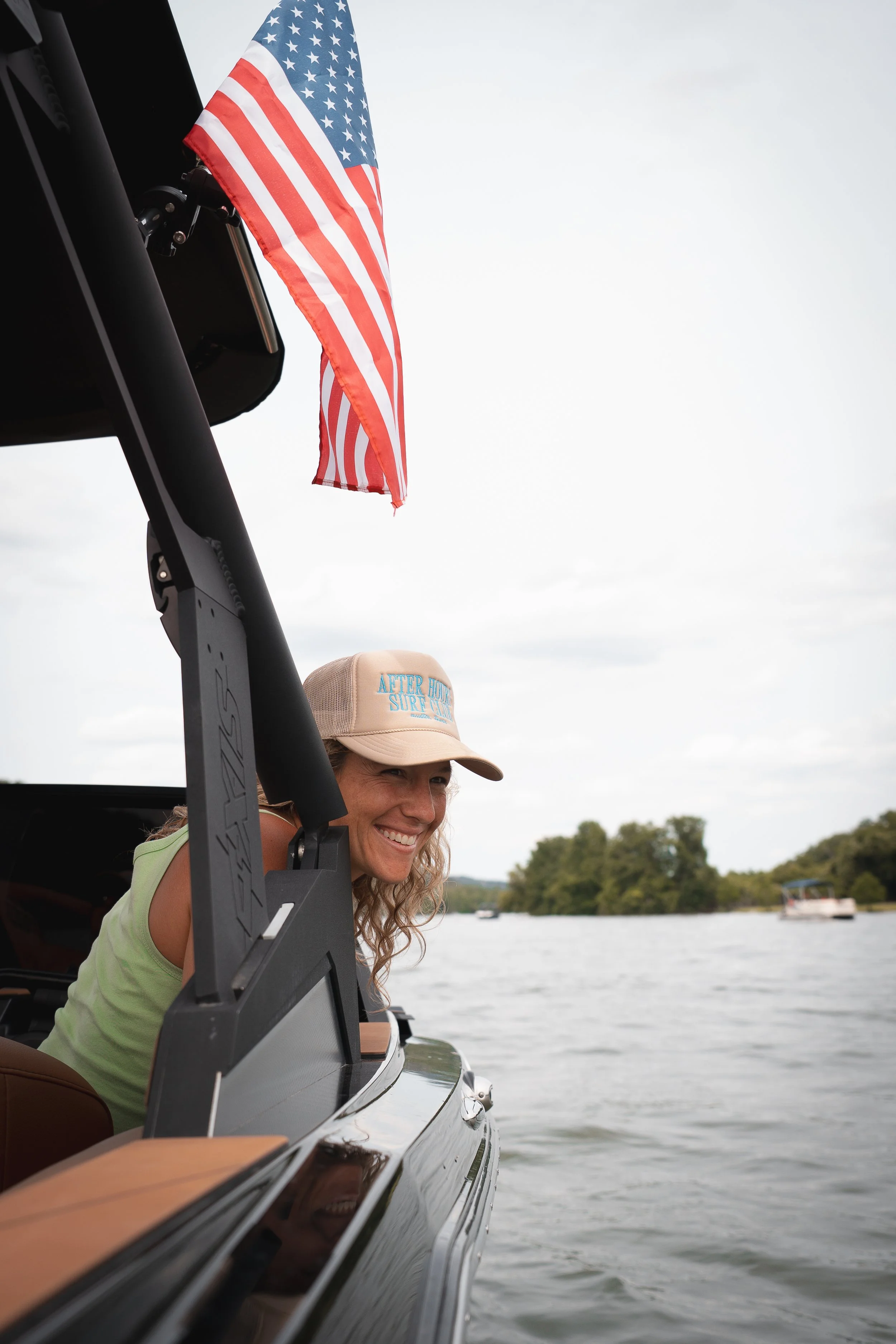 Austin women enjoying a wake surf club day on Lake Austin boat