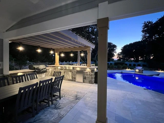 ArtisanPools_Housman_finishedKitchenAtNight.jpg