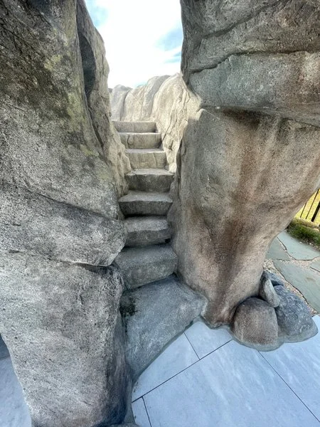 ArtisanPoolsNC_GrottoPool_GrottoStairs.jpg
