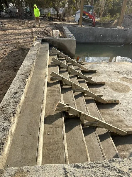 ArtisanPoolsNC_Ayers_StairsForming2.jpg