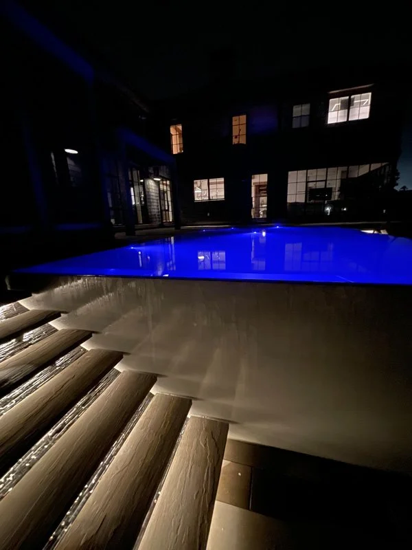 ArtisanPools_LawsonProject_NightStairs.jpg
