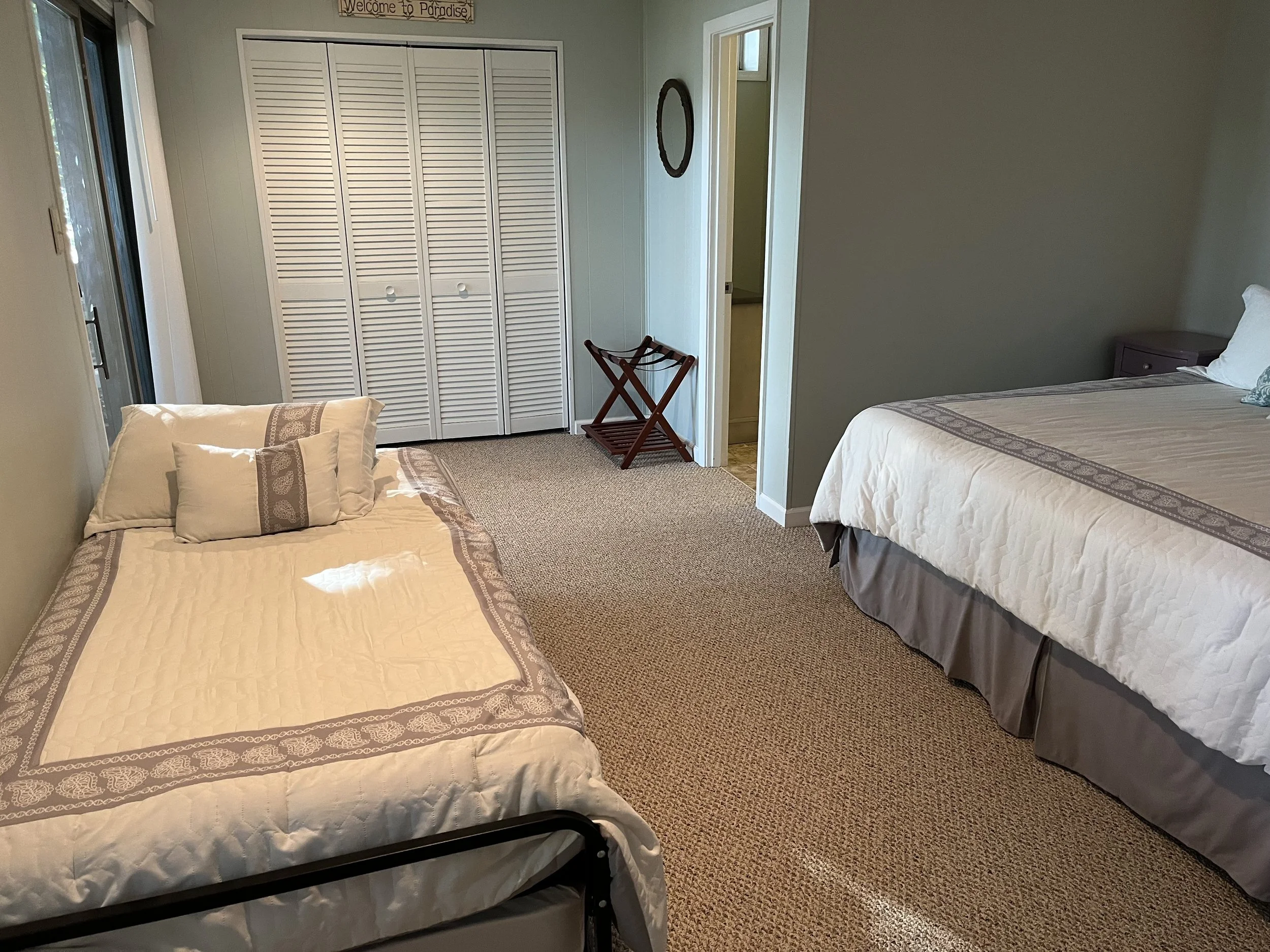 Bedroom #4 with king bed, twin bed, and twin trundle.