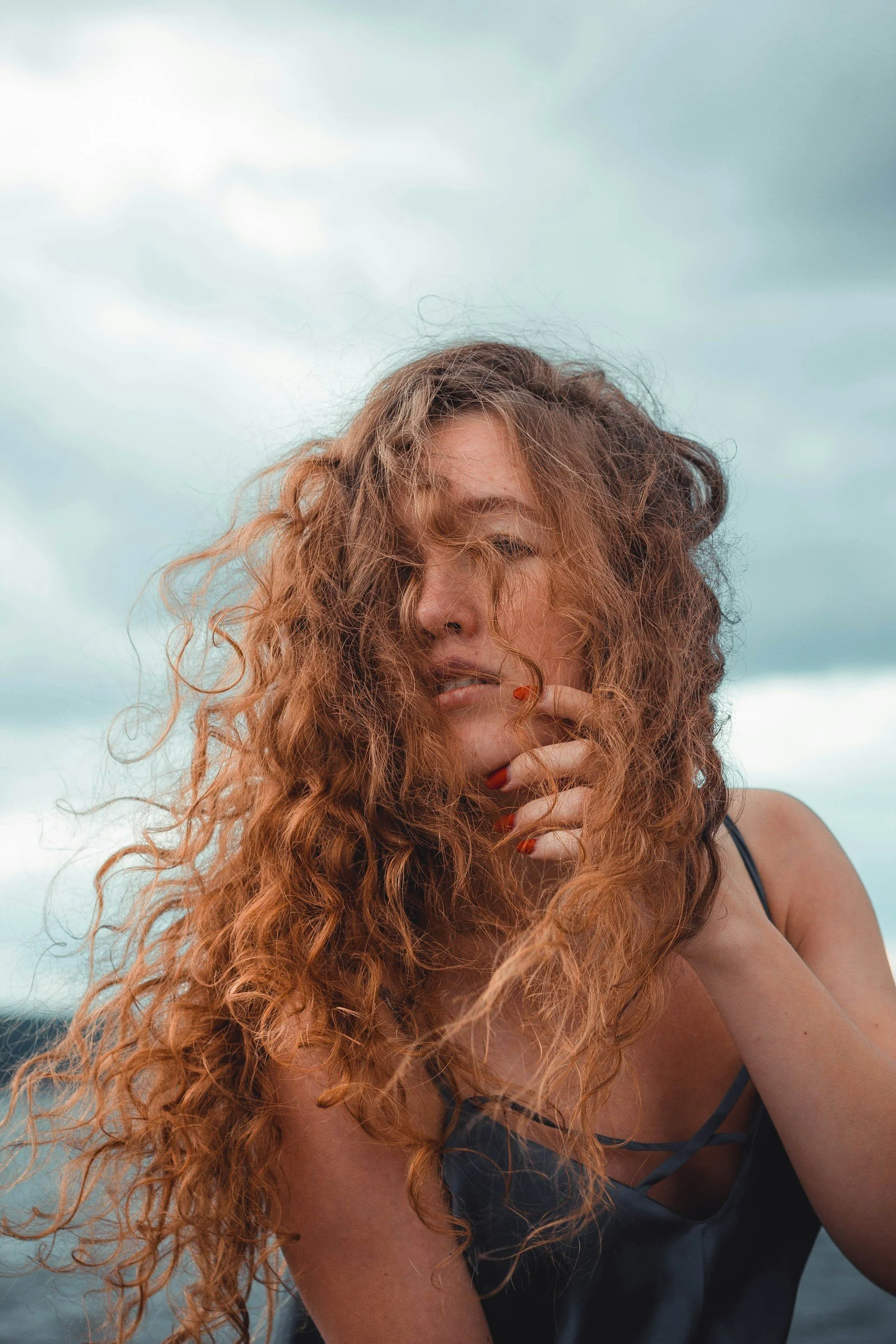 How to Tame Frizz Without Weighing Hair Down