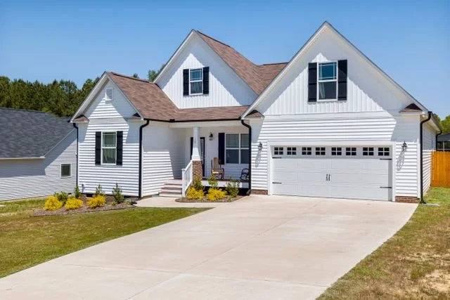 Exterior of a single-family home in North Carolina, representing the marital home during a divorce.