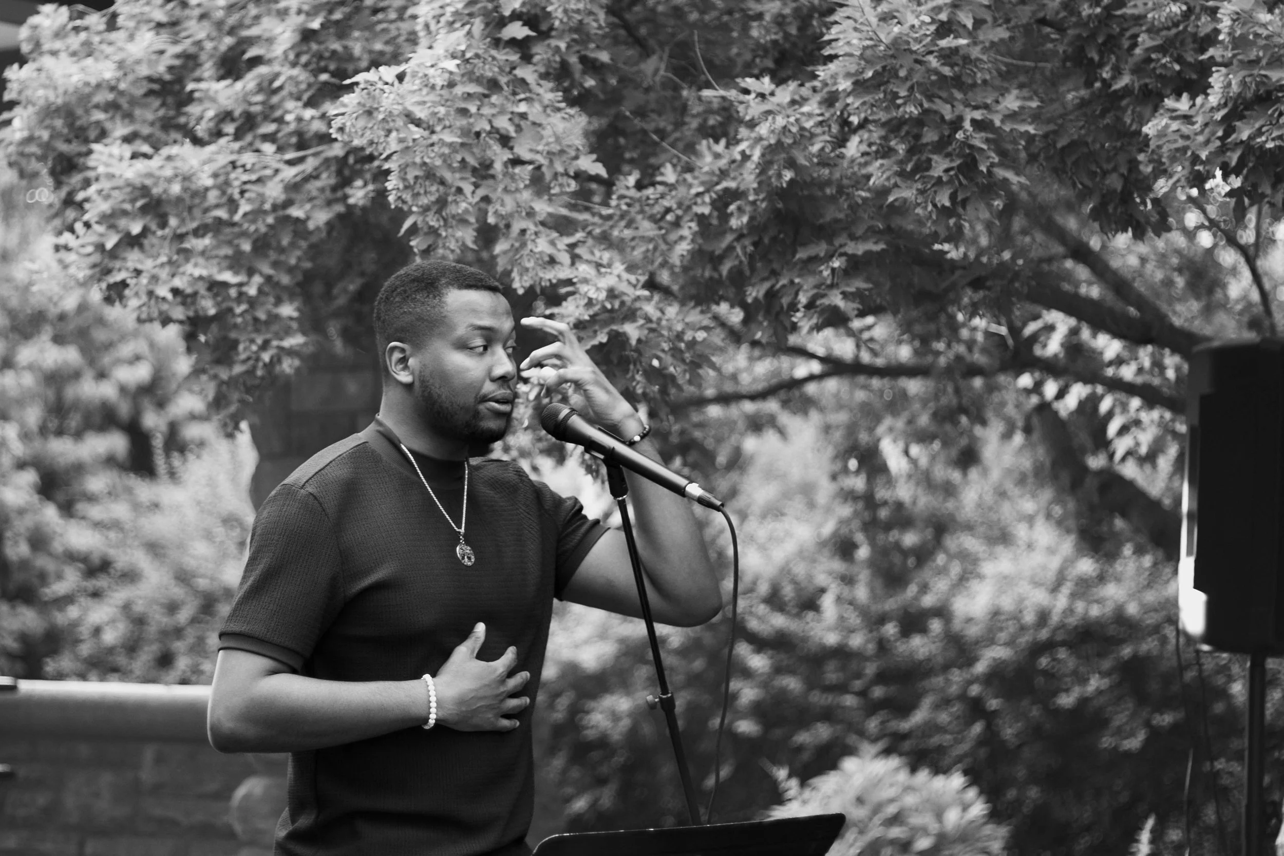 Image of Ryan Boyland performing a poem