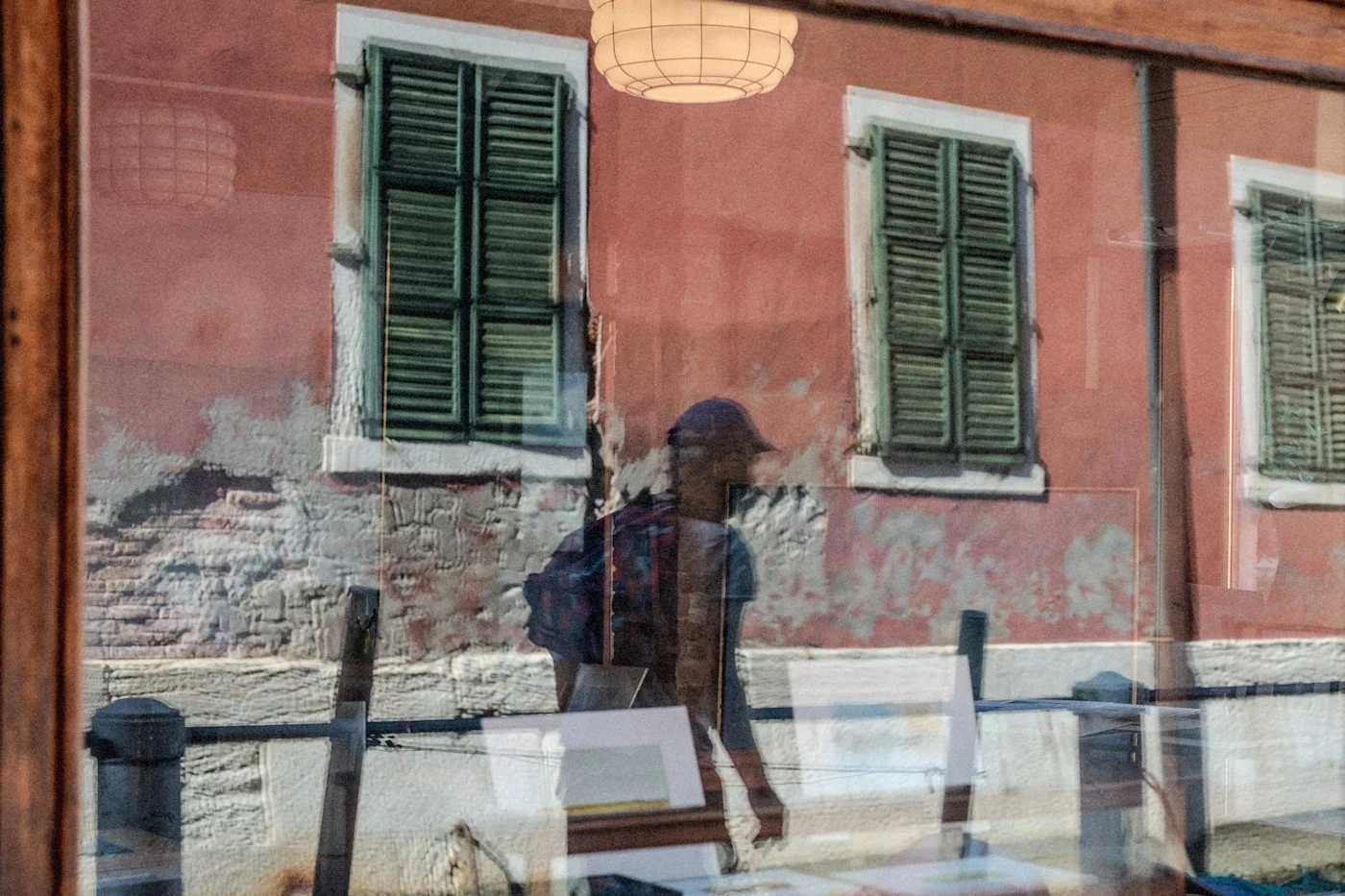 Reflection on a window captured by the Carpe Diem Holistic photographers.