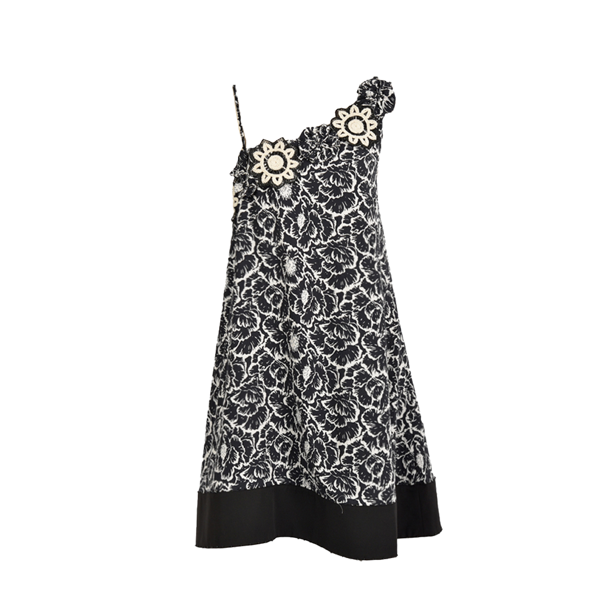 Black and white floral patterned dress with spaghetti straps and floral embellishments on the shoulder.