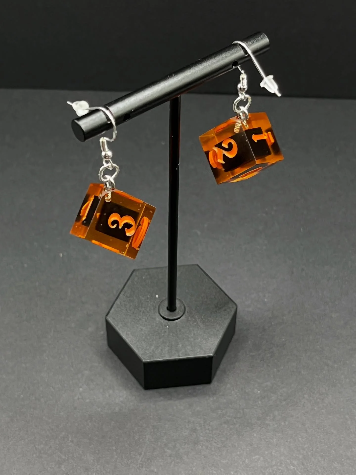 Custom dice earrings now live on the shop! #diceearrings #dnd #chicago #shopsmall #ttrpgdice