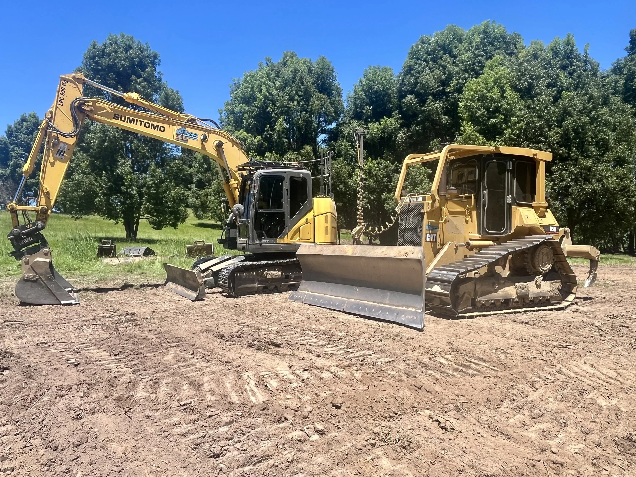 14T Sumitomo Excavator and D5H Cat Dozer parked up after finishing a Dam cut out and Land Clear in Dulguigan NSW 