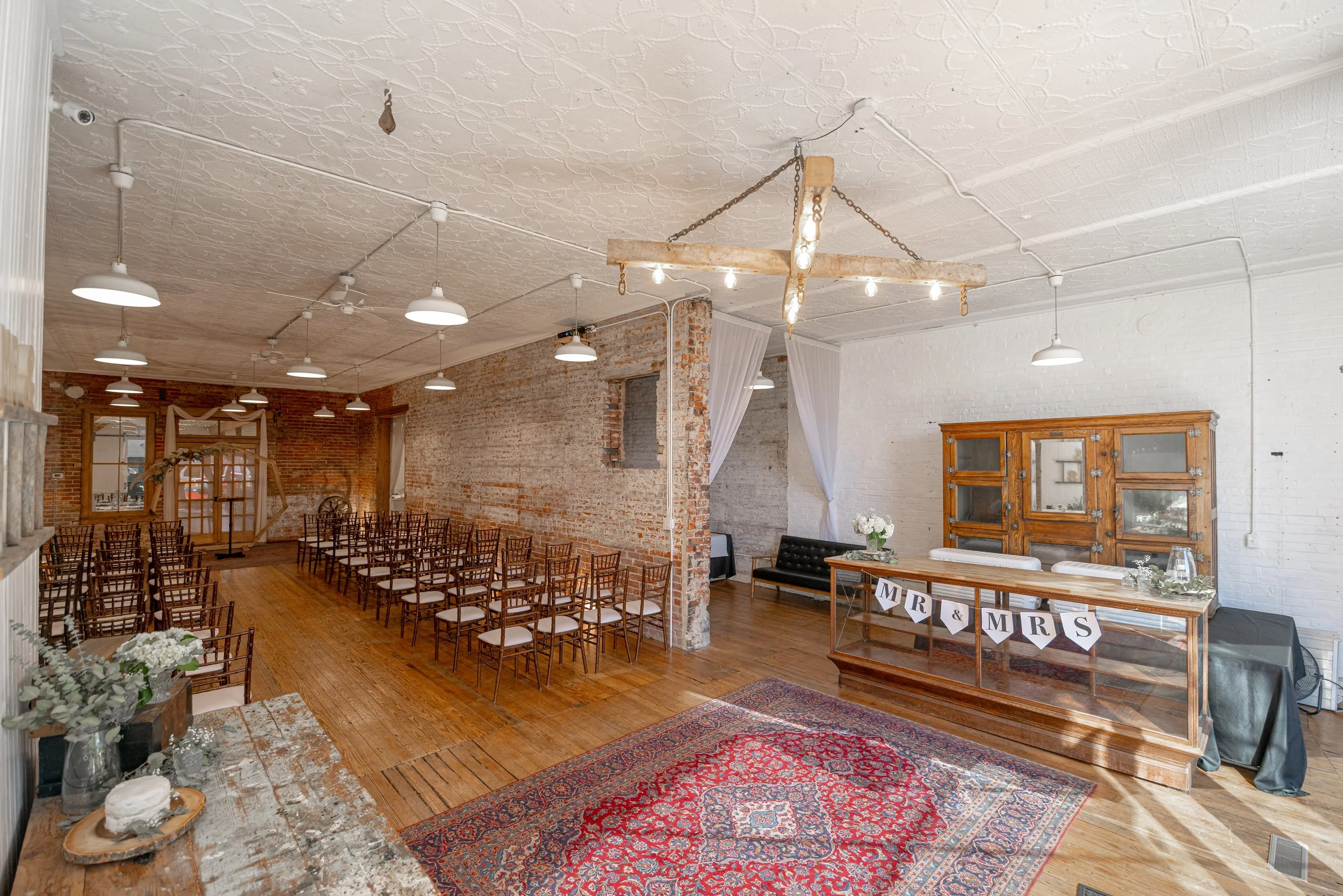 Ceremony setup with entryway with old bar location.